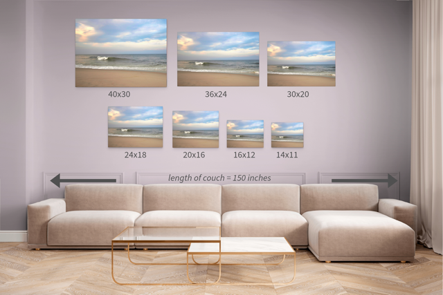 Seven canvas prints of a beach scene displayed above a sofa with different measurements shown.