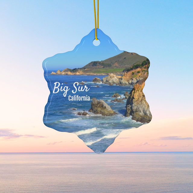 Ceramic Christmas ornament featuring a photograph of the rugged cliffs and deep blue Pacific Ocean along the Big Sur coastline in California 
