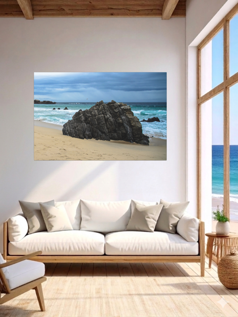 Living room with a Big Sur California coastal rock formation canvas print on the wall