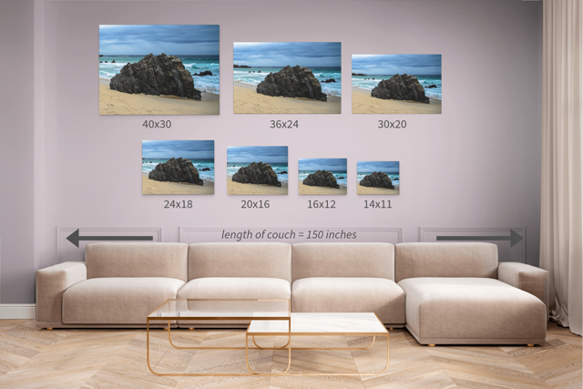 Living room with a beige sectional sofa and wall art displaying different sizes of the same canvas print.