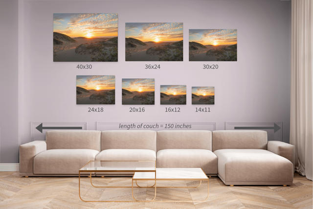 Seven versions of a canvas print of a beach dunes sunset displayed above a sofa with measurements indicated.