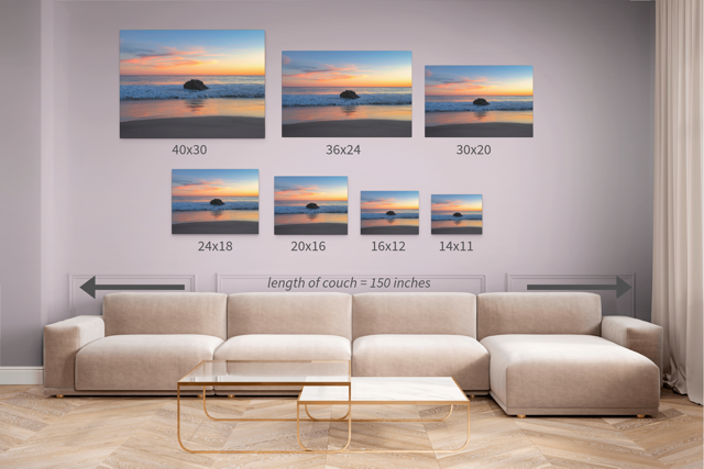 Living room with a beige sectional sofa and wall art displaying sunset scenes with measurements.