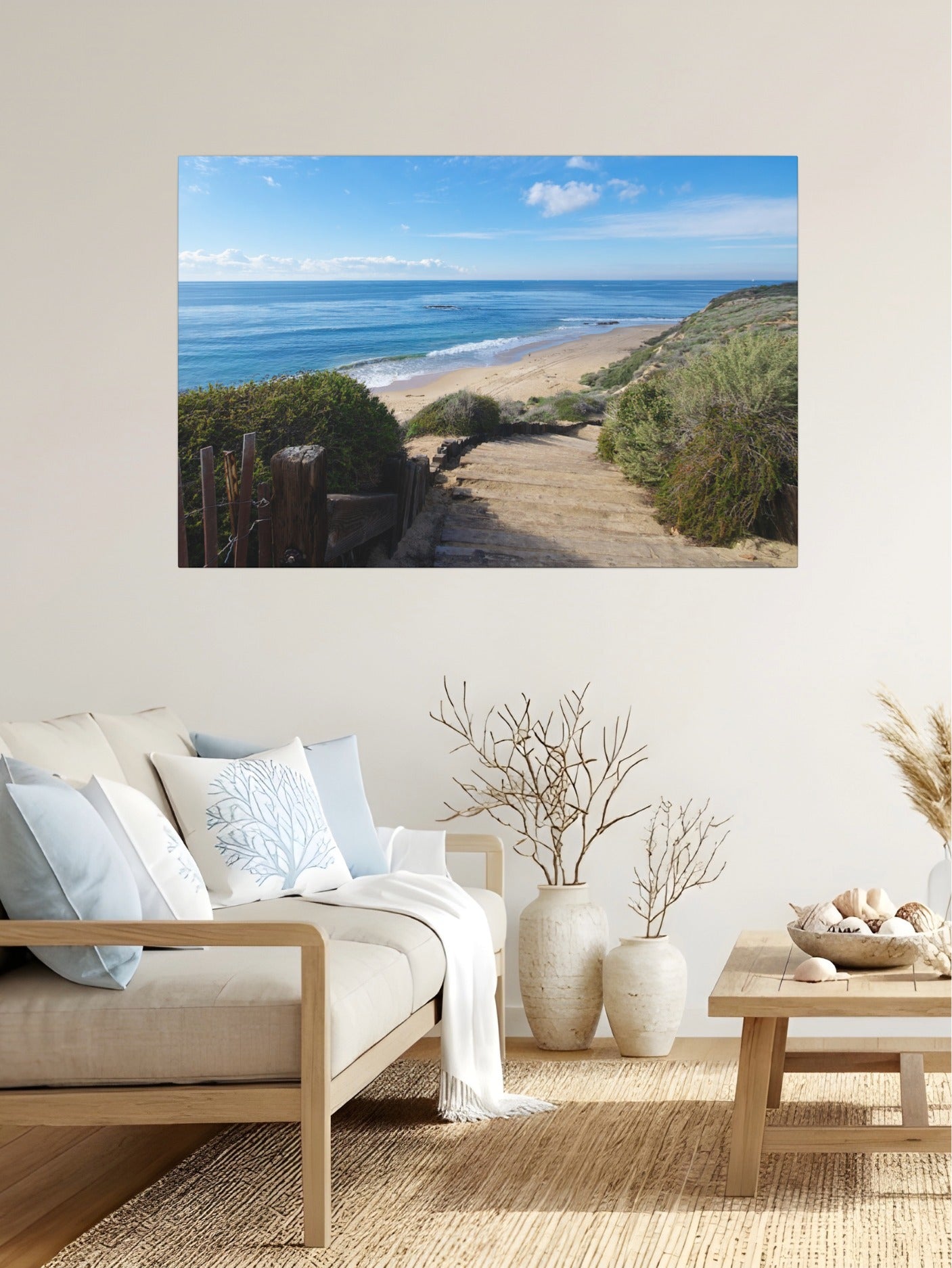 Living room with a canvas print of the wooden stairs leading to Crystal Cove State Beach in Orange County California.
