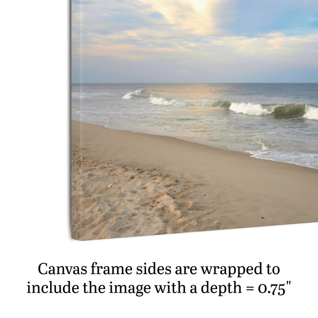 Side view of a canvas print of a wide-angle view of the Jersey Shore beach at early evening with rolling ocean waves and a bright, cloudy sky, with text indicating frame depth.