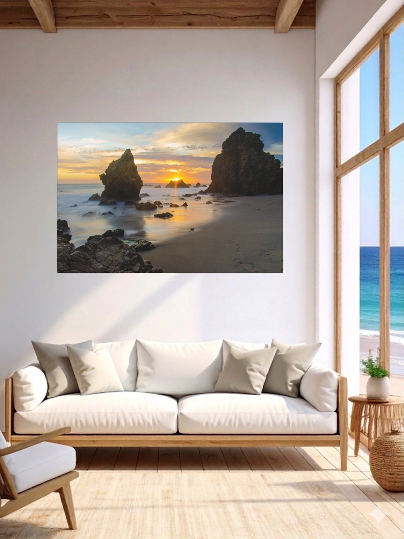 Living room with an El Matador State Beach winter sunset with dramatic sea stacks and golden sunburst canvas print on the wall