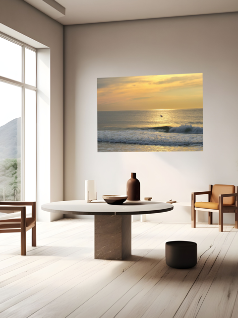 Modern living room with a large canvas print of a bird in flight over the ocean at sunrise.