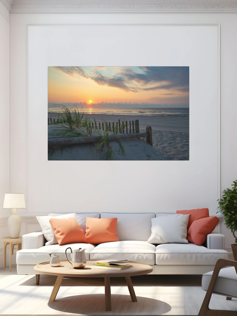 Living room with a large canvas print featuring a sunrise over the ocean as seen from behind the dunes on the Jersey Shore on the wall above a white sofa with colorful cushions.