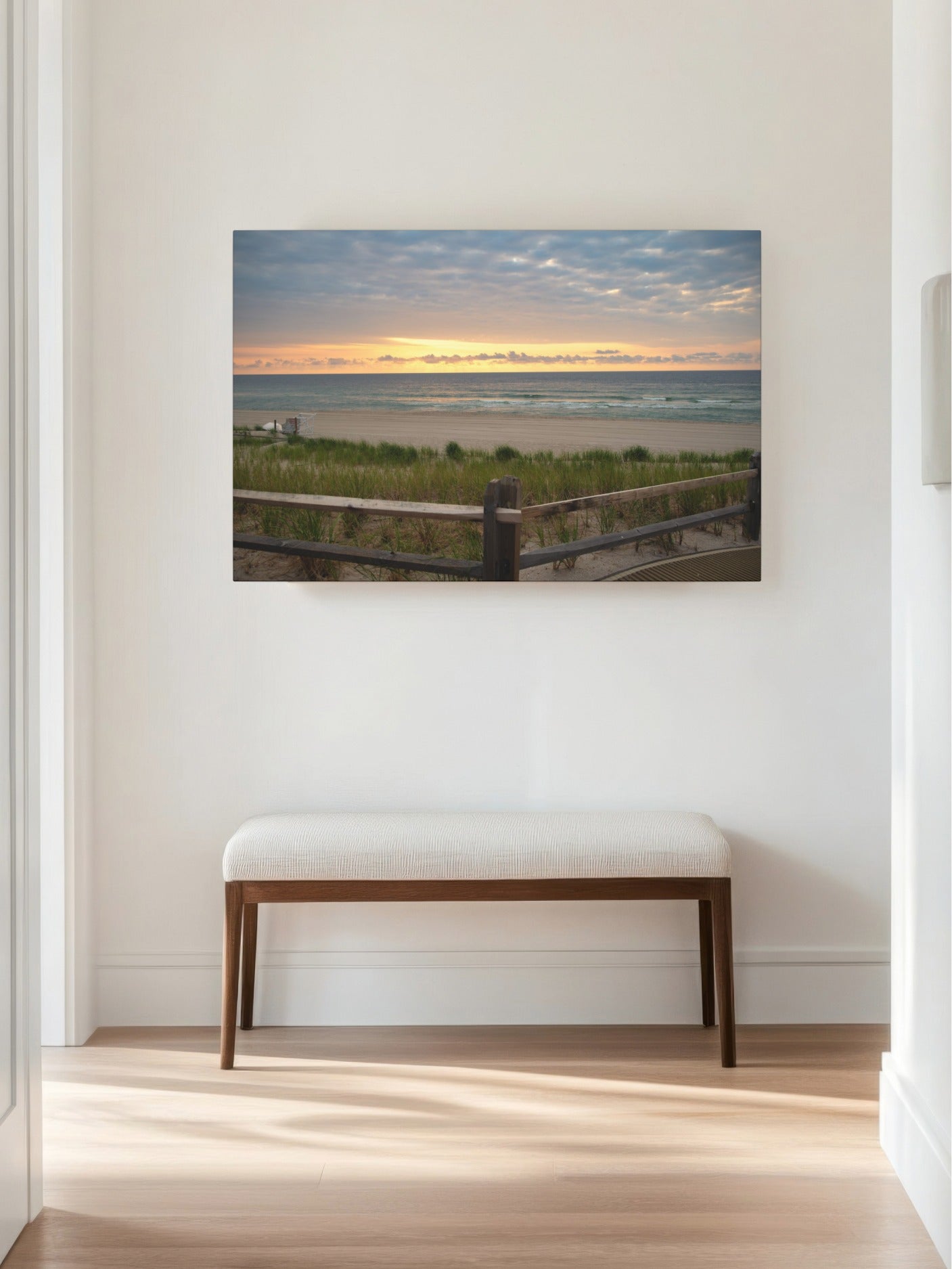 Canvas print of a Jersey Shore sunrise over the Atlantic Ocean with beach dunes and grass on a wall above a wooden bench