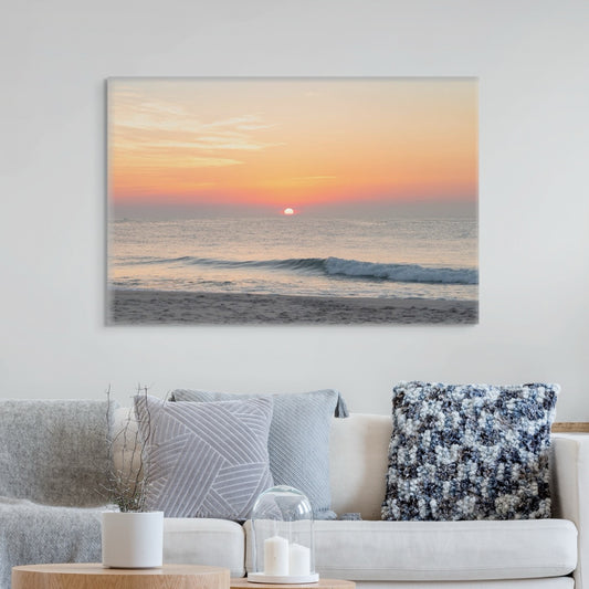 Living room with a large canvas print featuring a summer sunrise over the Atlantic Ocean as seen from a quiet beach on the Jersey Shore on the wall.