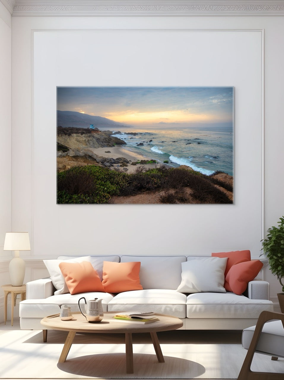 Living room with a large canvas print of the sunrise over the mountains as seen from the cliffs of Leo Carrillo State Beach near Malibu, California on the wall.