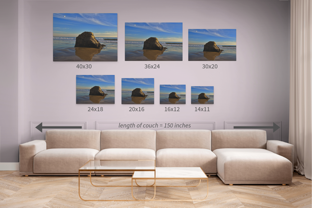 Beige sectional sofa with a wall displaying the same canvas print in seven different sizes.