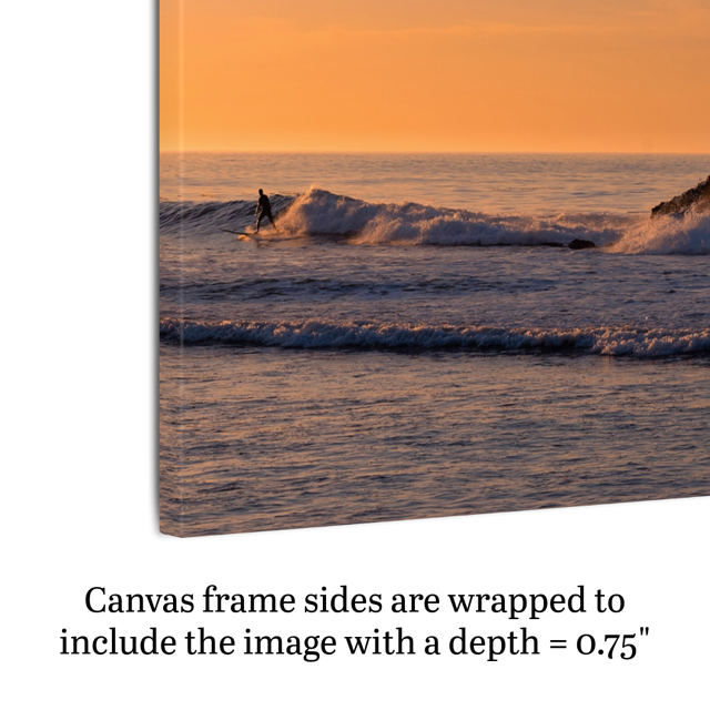 Side view of a canvas print featuring a surfer riding a wave at sunrise with text indicating frame depth.