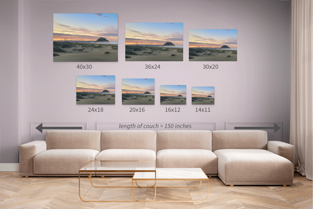 Wall art prints of a landscape arranged above a sofa with measurements indicated.