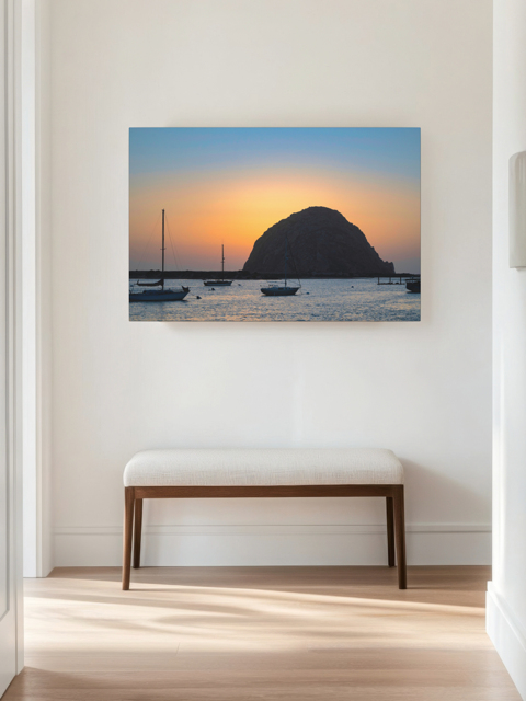 Canvas print of a Morro Rock sunset in a room with a bench.