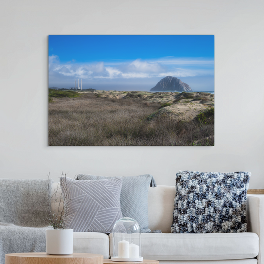 Morro Rock and stacks view from the beach dunes canvas print on a wall above a sofa.