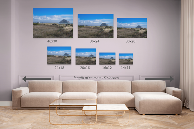 Living room with a beige sectional sofa and wall art displaying various sizes of landscape prints.