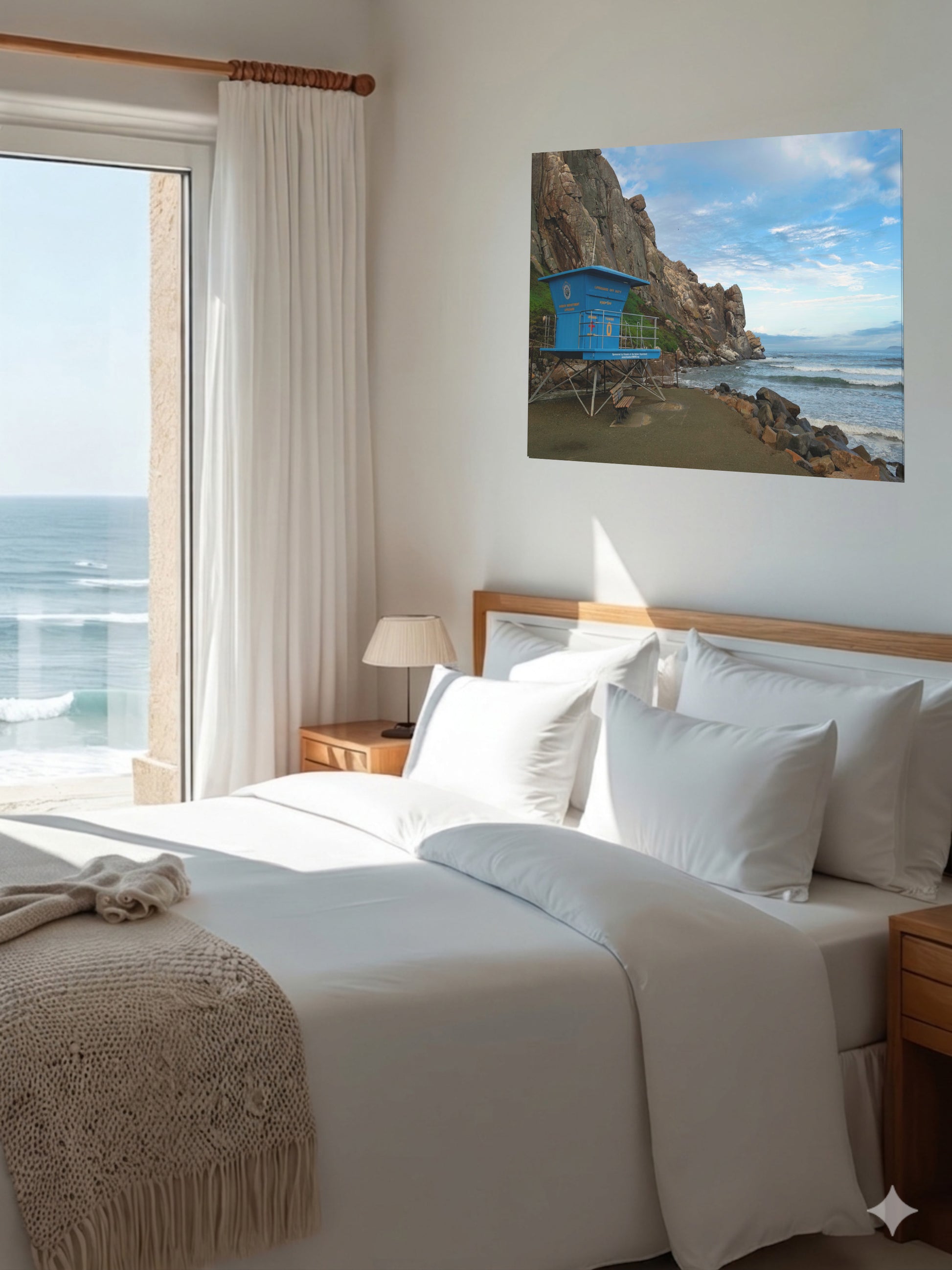 Bedroom with ocean view and blue lifeguard tower at the base of Morro Rock in Morro Bay California canvas print on the wall