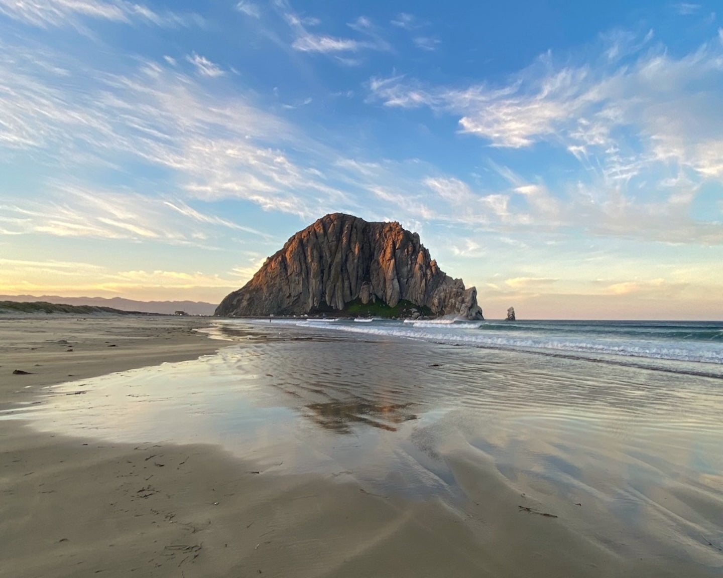 A view of Morro Rock and the beach in Morro Bay, California