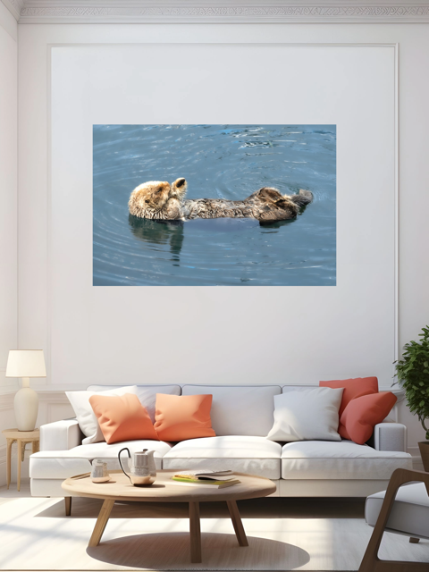 Living room with a large wall art of a sea otter in water above a white sofa with colorful cushions.