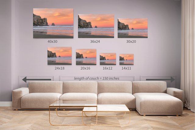 Living room with a beige sectional sofa and wall art displaying various sizes of a ocean sock sunrise scene.
