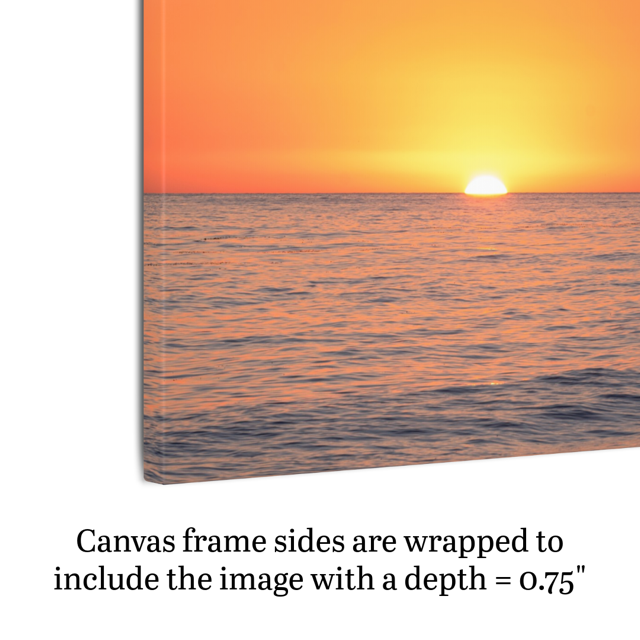 Side view of a canvas print of a sunset over the ocean.