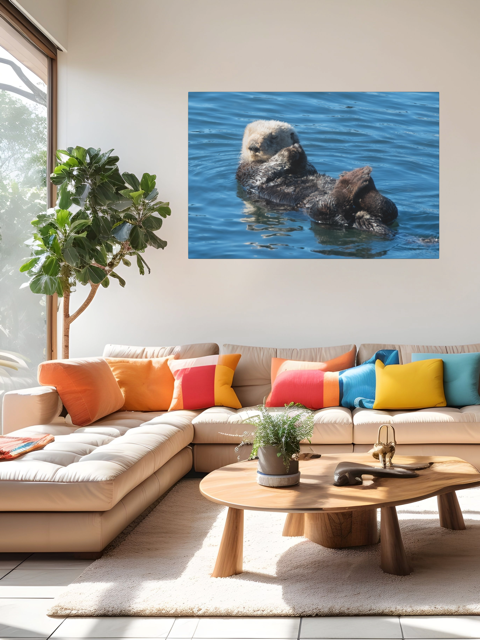 Living room with a sectional sofa, colorful pillows, and a wall art of a sea otter in water.