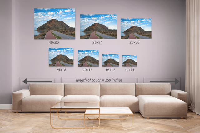 Living room with a beige sectional sofa and Road to Morro Rock canvas prints with various dimensions displayed.
