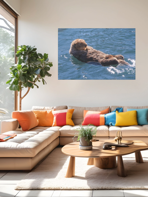 Living room with a sectional sofa, colorful pillows, and a wall art of an otter in water.