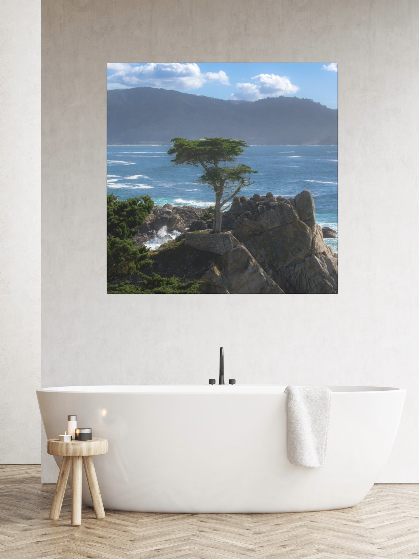 Canvas print of the lone cypress tree at Pebble Beach on a rocky cliff, displayed above a white bathtub.
