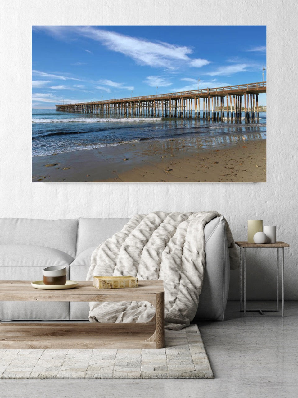 Canvas print of Ventura Pier in California on wall above sofa